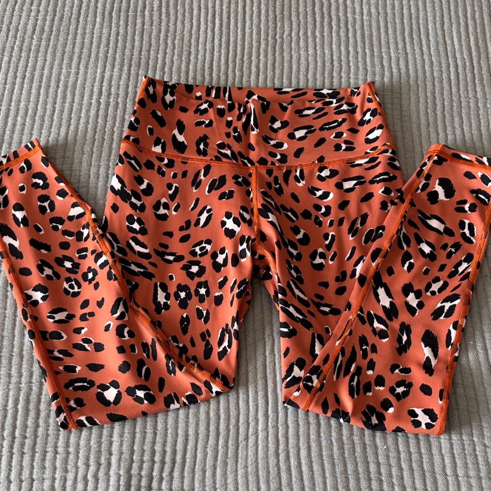 Fabletics PowerHold Orange & Black Leopard Print Leggings